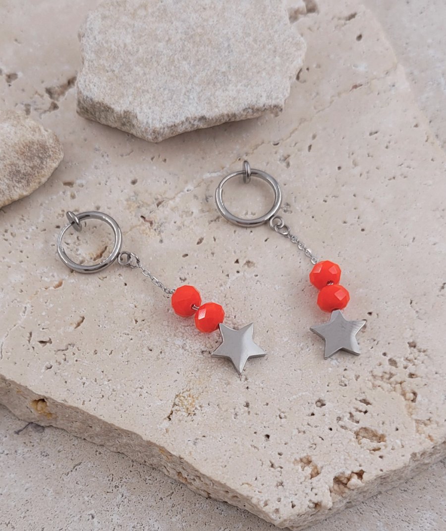 Boucles oreilles clips acier orange étoile non percées