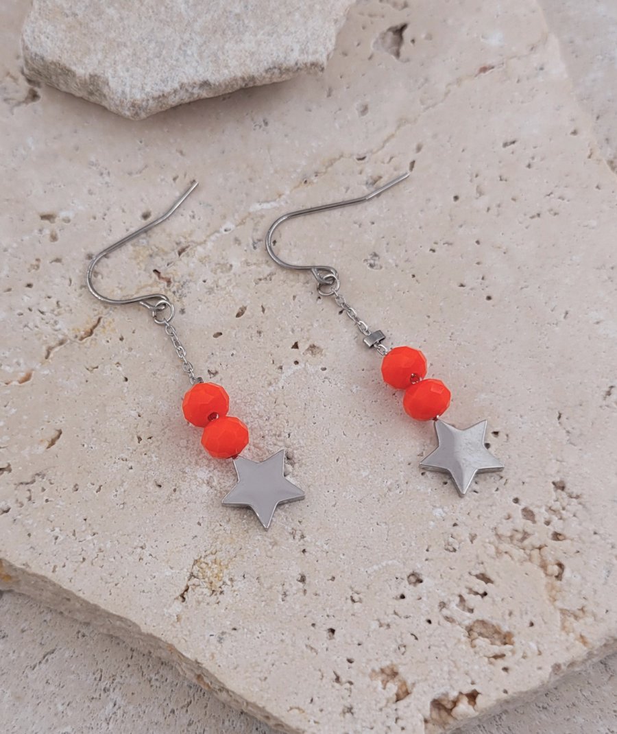 Boucles oreilles acier orange étoile
