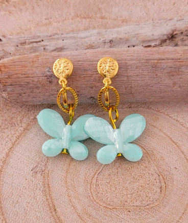 Boucles oreilles à clips créateur avec un papillon vert d'eau pour les filles qui veulent faire comme maman