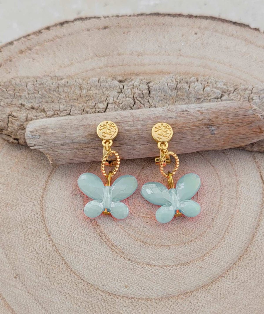 Boucles oreilles à clips créateur avec un papillon vert d'eau pour les filles qui veulent faire comme maman